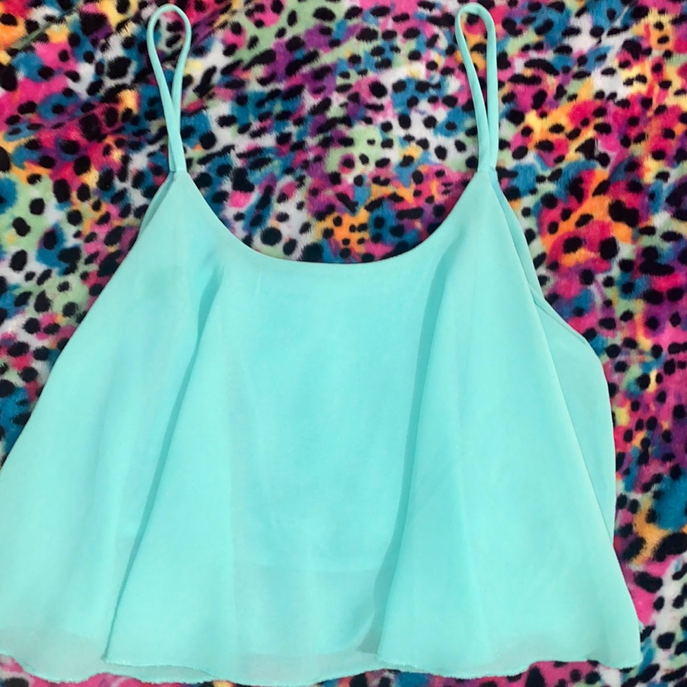 Turquoise flowy crop top.